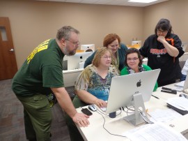 (L-R) Lions Brian Geffre, Gayle Hyde, Denise Johnson, Yvonne Kalka, and Terri Egan check tabulations before finals.