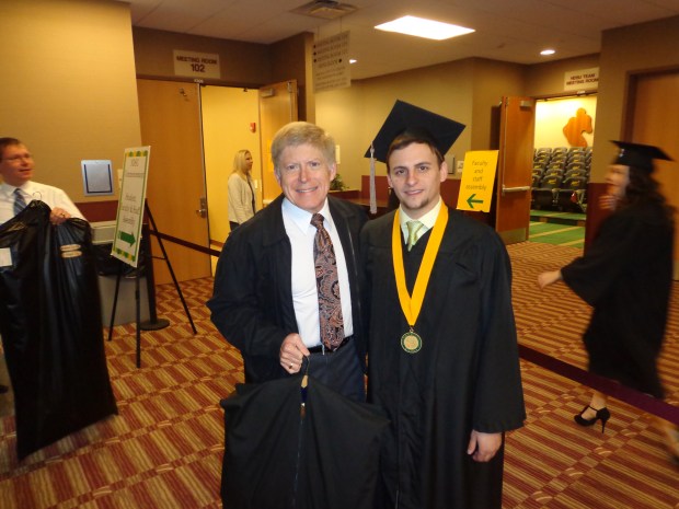Campus club advisor Lion Robert and NDSU Club President Shane celebrate graduation!