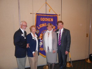 DG Manny and Kathy Pardo join us in front of their home club banner.