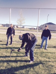 PDG Kevin Vannett takes a turn at pounding a stake!