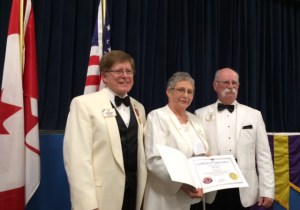 Pictured here is ID Robert, PDG Ellie Mae, and DG Garry at the banquet.
